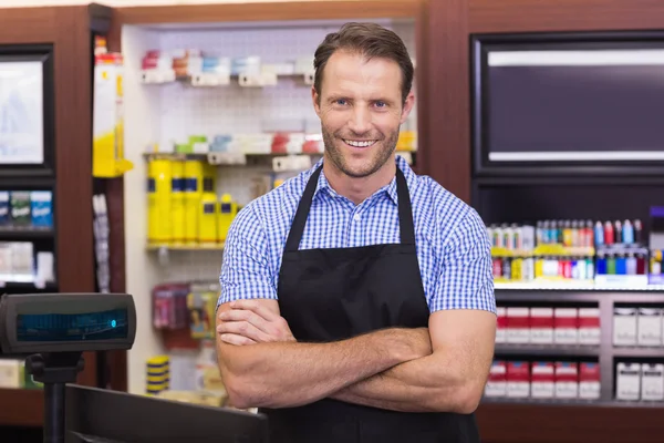 Portrait of a smiling handsome with arms crossed — Stock Photo, Image