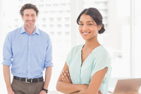 Casual business partners smiling at camera — Stock Photo, Image