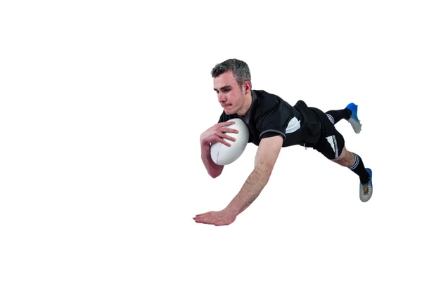 Een rugbyspeler een poging te scoren — Stockfoto