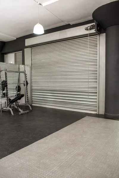 Exercise room with shutters — Stock Photo, Image