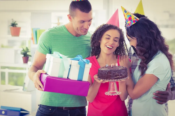 Casual business team celebrating a birthday — Stock Photo, Image