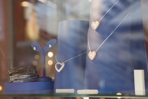 Necklace behind glass — Stockfoto