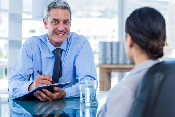 Happy business people speaking together — Stock Photo, Image