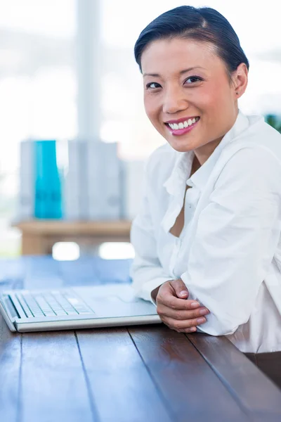 Happy businesswoman looking at camera Stock Image
