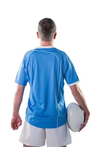 Rugby player holding a rugby ball — Stock Photo, Image