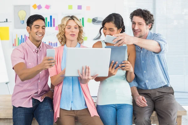 Casual businesspeople using digital tablet — Stock Photo, Image