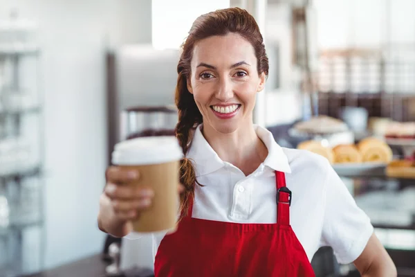 Pretty barista giving take-away cup — Stock Photo, Image