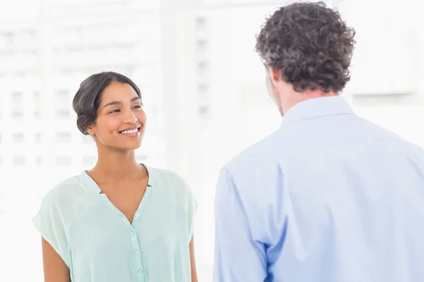 Casual business partners smiling — Stock Photo, Image