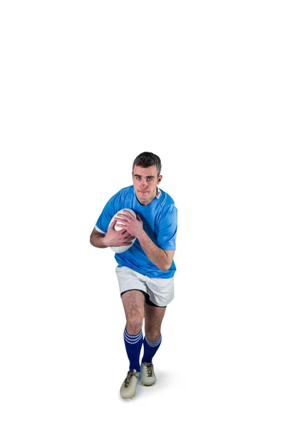 Jugador de rugby corriendo con la pelota de rugby —  Fotos de Stock