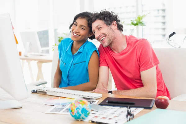 Partners working together on tablet — Stock Photo, Image