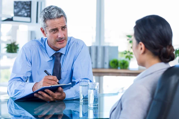 Serious business people speaking together — Stock Photo, Image