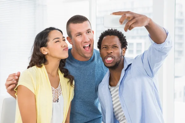 Colleagues taking selfies — Stock Photo, Image