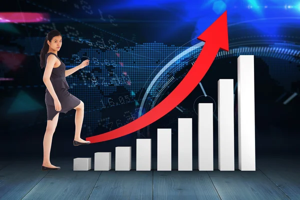 Businesswoman stepping up by graph — Stock Photo, Image