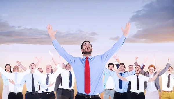 Businessman raising arms — Stock Photo, Image