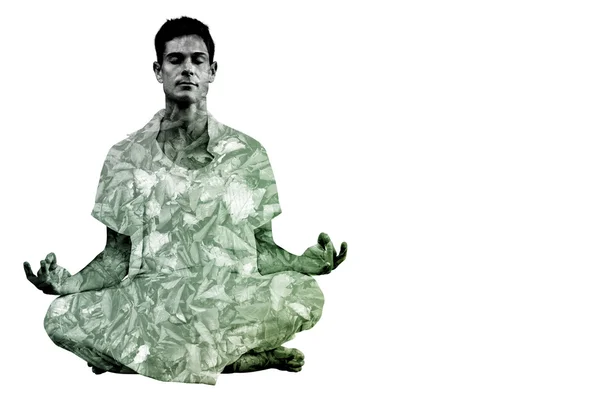 Man meditating in lotus pose — Stock Photo, Image