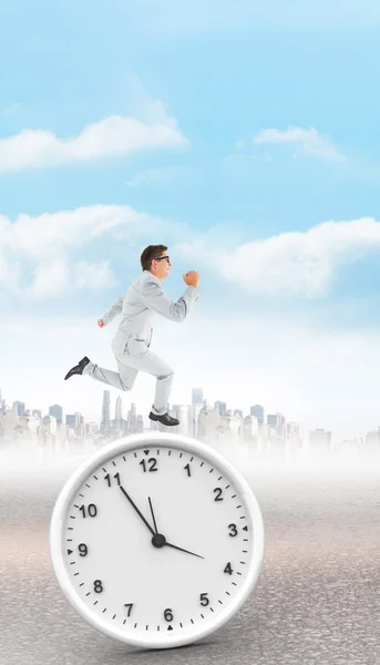 Geeky happy businessman running mid air — Stock Photo, Image