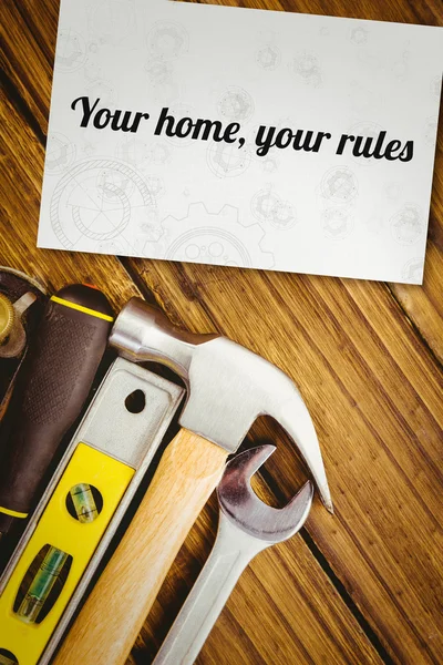 Palavra sua casa, suas regras contra o cartão — Fotografia de Stock