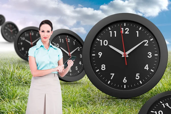 Businesswoman using calculator — Stock Photo, Image