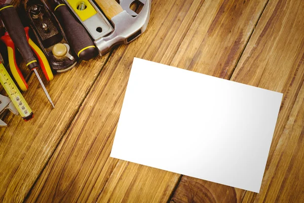 White card against tools — Stock Photo, Image