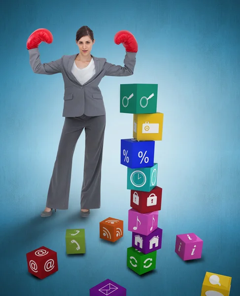 Businesswoman with boxing gloves — Stock Photo, Image