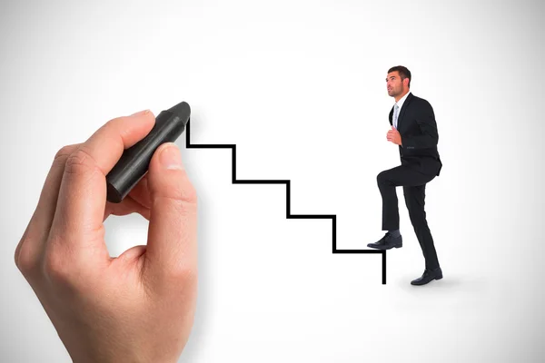 Businessman walking with leg up — Stock Photo, Image