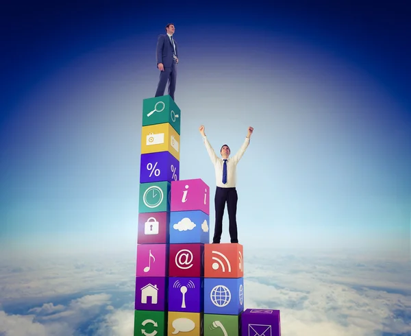 Businessmen cheering against sky — Stock Photo, Image