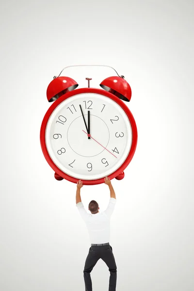 Zakenman bedrijf alarm clock — Stockfoto