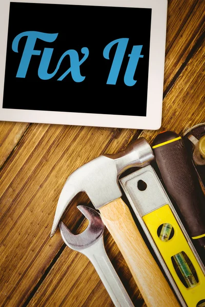 Word fix it and tablet pc — Stock Photo, Image