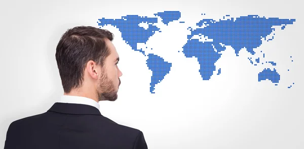 Businessman against world map — Stock Photo, Image