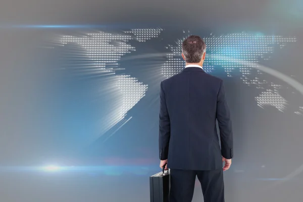 Businessman holding a briefcase — Stock Photo, Image