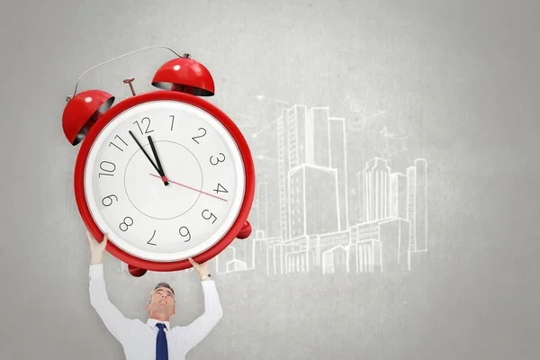 Zakenman bedrijf alarm clock — Stockfoto