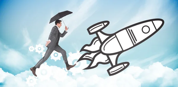 Obraz kompozytowy biznesmen skakanie trzymając parasol — Zdjęcie stockowe