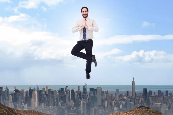 Businessman standing in tree pose — Stock Photo, Image
