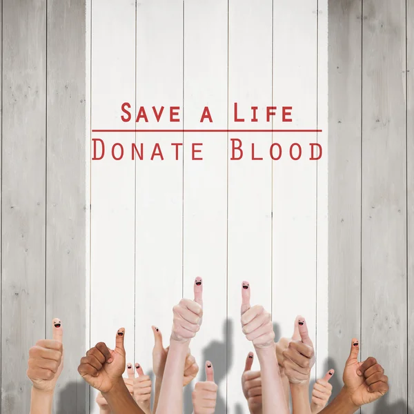 Blood donation against wooden planks — Stock Photo, Image