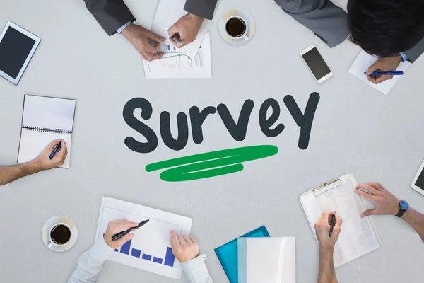 Survey against business meeting — Stock Photo, Image