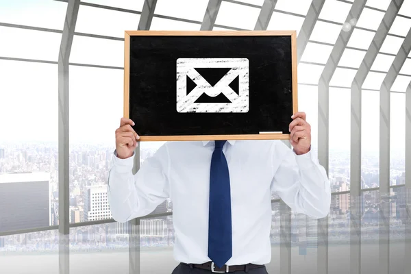 Businessman showing board — Stock Photo, Image