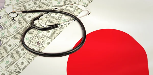 Stethoscope against flag and pile of dollars — Stock Photo, Image