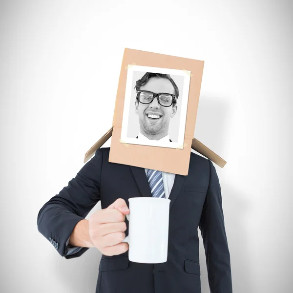 Businessman with photo box on head — Stock Photo, Image