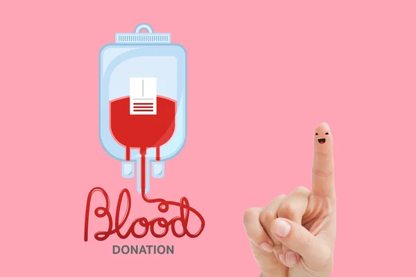 Blood donation against pink — Stock Photo, Image