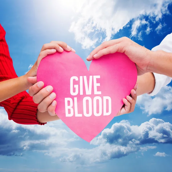 Hands holding blood donate card — Stock Photo, Image