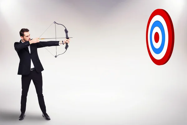 Empresario tiro arco y flecha — Foto de Stock