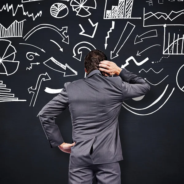 Thinking businessman scratching head — Stock Photo, Image
