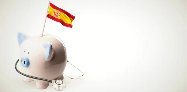 Spain national flag in piggy bank — Stock Photo, Image