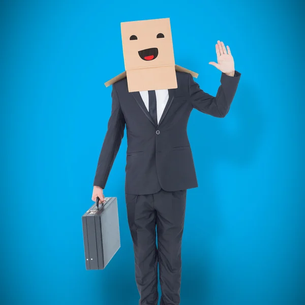 Businessman standing with box on head — Stock Photo, Image
