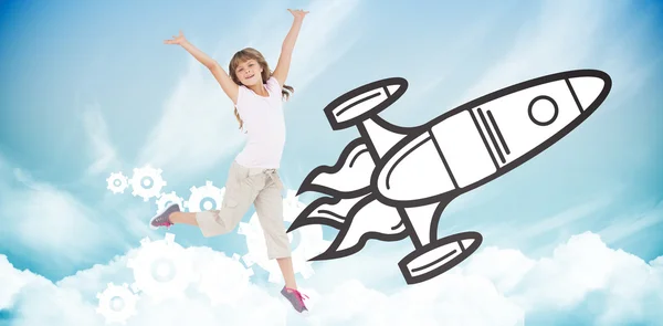 Meisje springen met raket — Stockfoto