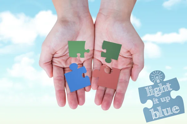 Hands aanduiding puzzelstukjes — Stockfoto