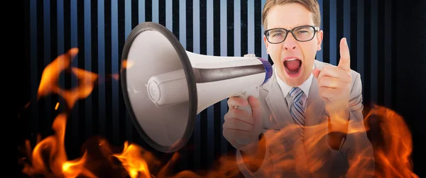 Businessman shouting with megaphone — Stock Photo, Image