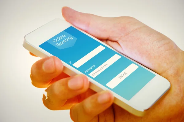 Hand hält Smartphone vor weißem Hintergrund mit Vignette — Stockbild Smartphone in der Hand — Stockfoto
