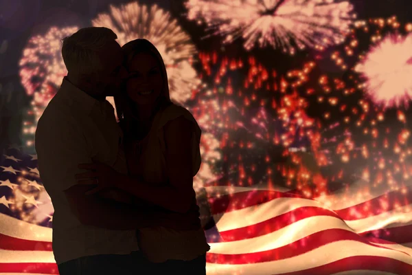 Man kissing wife on cheek — Stock Photo, Image