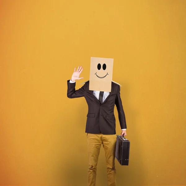 Businessman with box on head — Stock Photo, Image